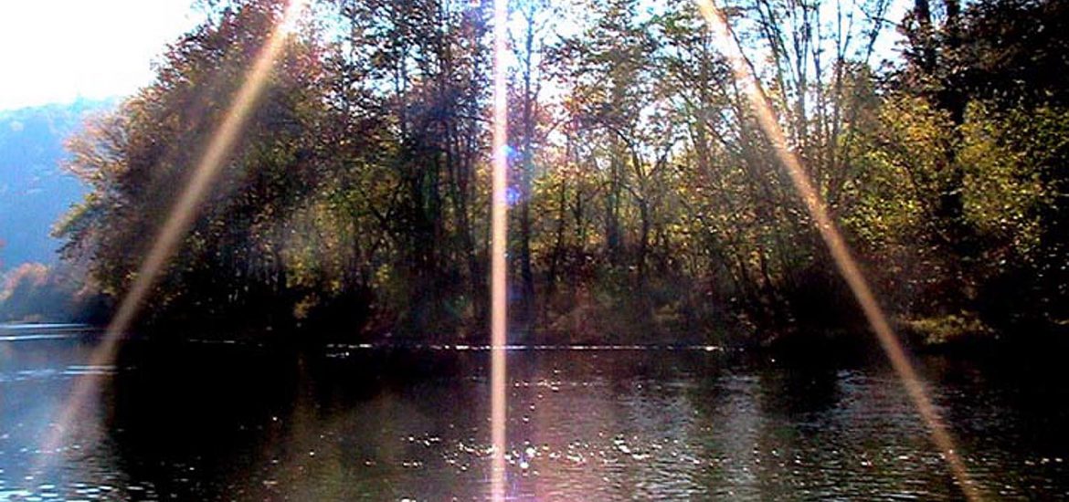 Sunburst Over River